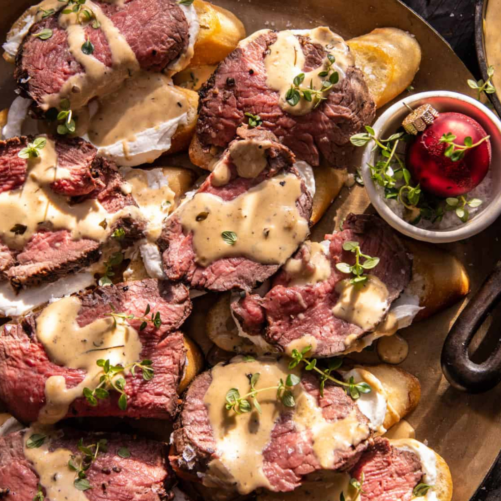 Filet Tenderloin Crostini with Parmesan White Wine Cream Sauce squallgirl